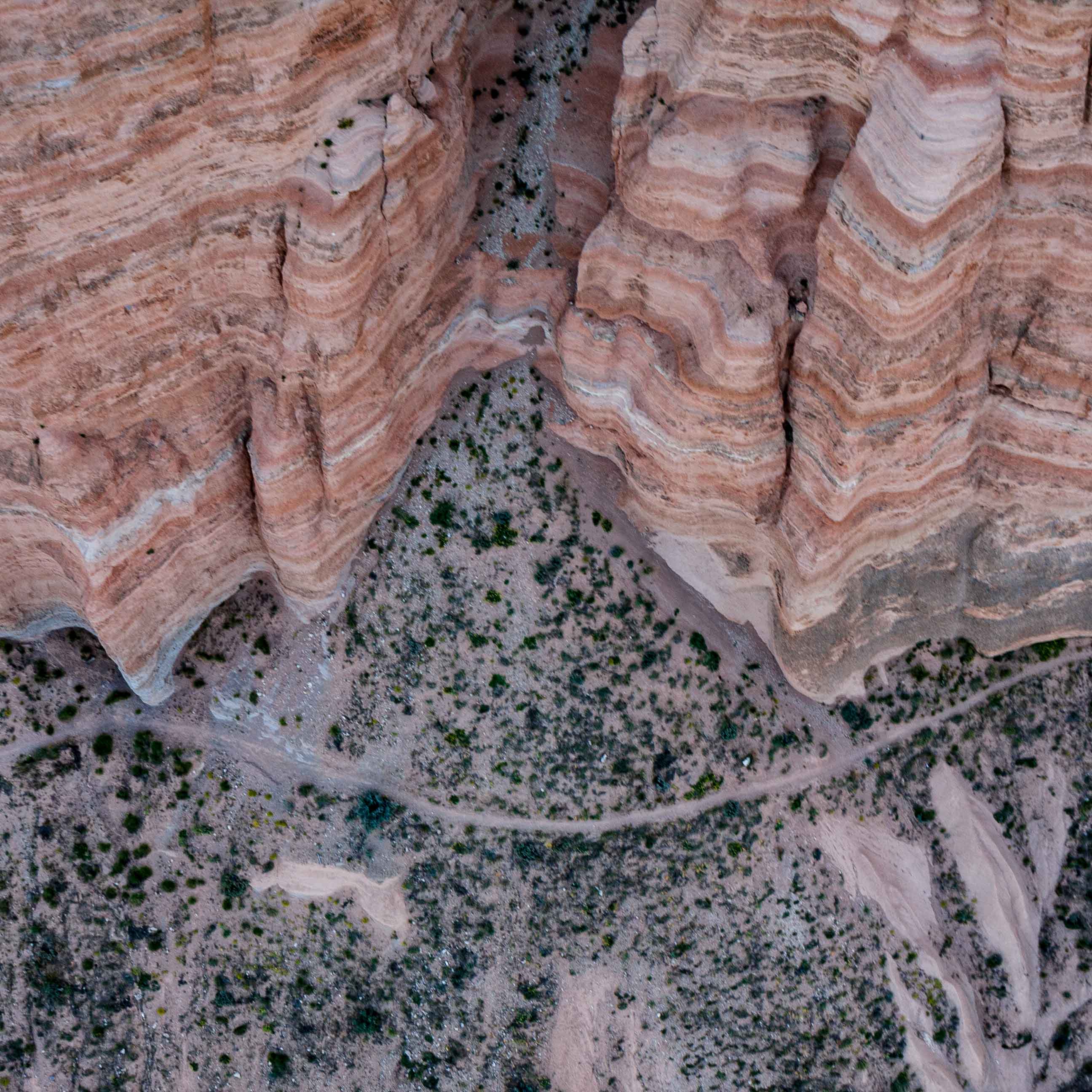 Hiking path below the towering rock formations of Cappadocia